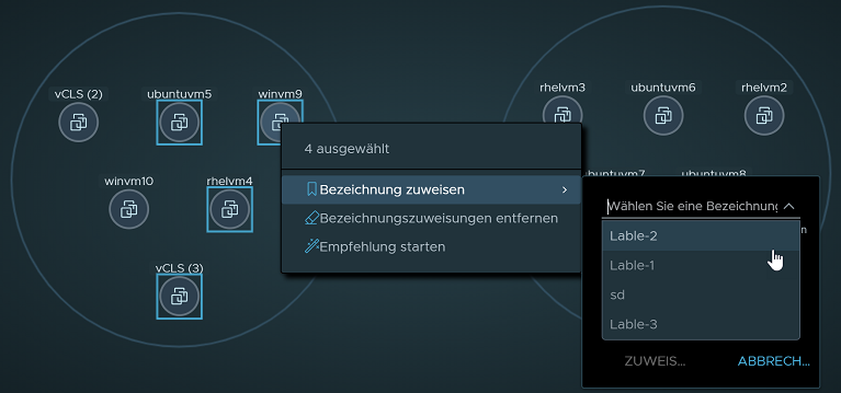 Image of Computes view with 4 selected nodes. The Assign a Label > Select a Label contextual menu is displayed.