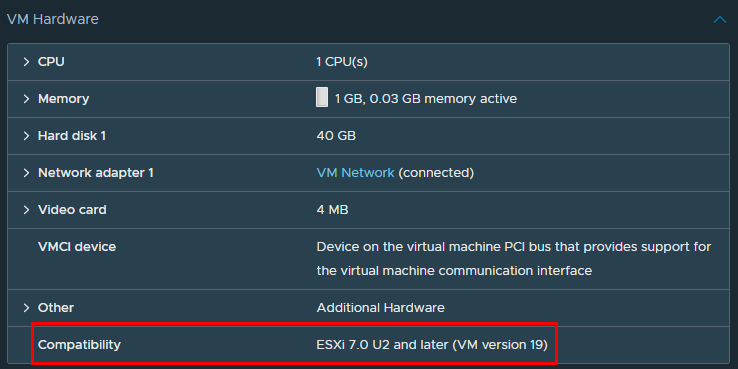 VM Hardware pane with compatibility information highlighted.