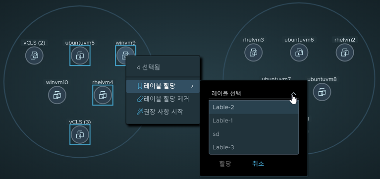 Image of Computes view with 4 selected nodes. The Assign a Label > Select a Label contextual menu is displayed.